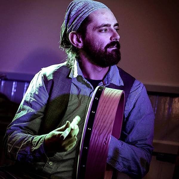 James Coogan playing bodhran